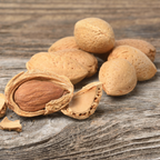 Almonds on a wooden surface