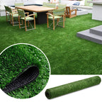 Artificial grass with a close-up of texture and a roll of grass on a white background.