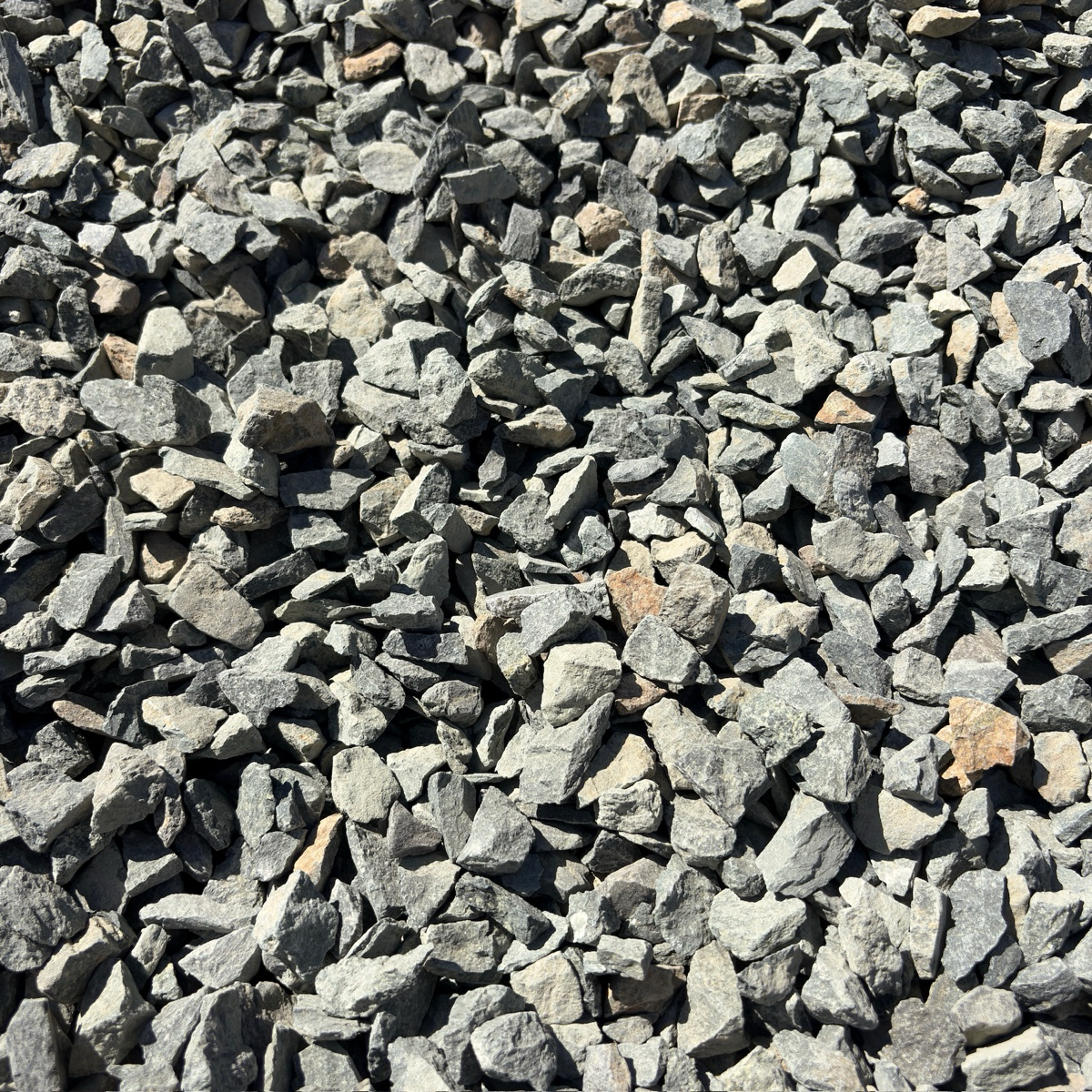 Close-up of small gray stones and pebbles