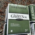 Bag of E.B. Stone Organics Big Harvest Garden Soil on a gravel background