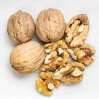 Walnuts with shells on a white background