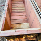 Wooden staircase with a focus on the steps and railings.